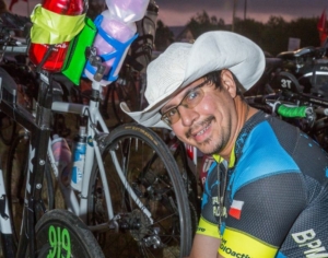man in cowboy hat gets ready in transition for the kerrville triathlon