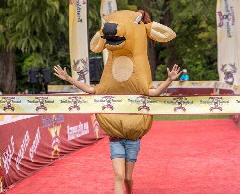 Kerrville Triathlon's mascot, Buck, crosses the finish line. Buck's ready for the largest field in Kerrville Tri history!