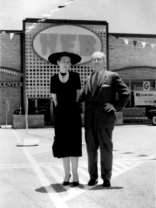 Howard Butt and his wife standing in front of H-E-B