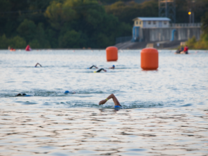 Look for buoys or landmarks to help you sight while on the swim course