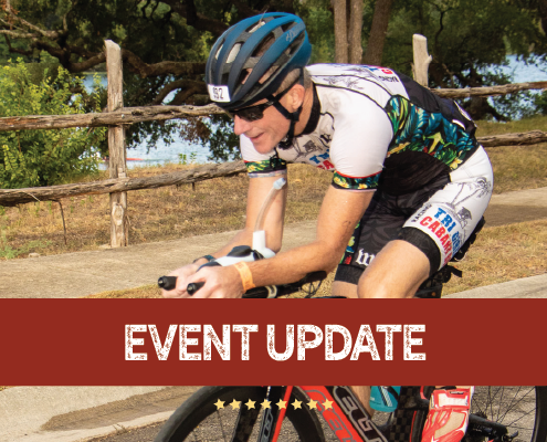 Image of cyclist during the Kerrville Triathlon Festival. Graphic contains the phrase "event update" and announces that 2020 Kerrville Triathlon is canceled.