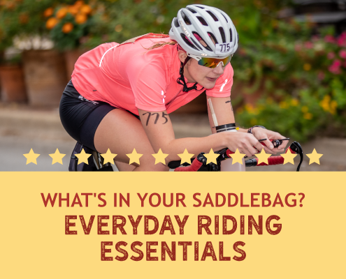 Female triathlete rides her bike during the 2019 Kerrville Triathlon. Text on design asks What's In Your Saddle Bag and the blog explains essential saddle bag items. Learn more at https://kerrvilletri.com/2020/10/saddle-bag-items/