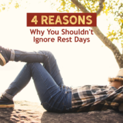Man takes a nap on the ground by a tree with his hat over his face. Text on design reads 4 Reasons Why You Shouldn't Ignore Rest Days. Learn more at http://kvy.b5e.myftpupload.com/2021/01/rest-days/