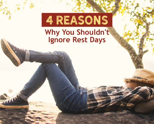 Man takes a nap on the ground by a tree with his hat over his face. Text on design reads 4 Reasons Why You Shouldn't Ignore Rest Days. Learn more at http://kvy.b5e.myftpupload.com/2021/01/rest-days/