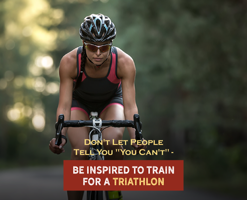 Cyclist rides her bike on a road through a forrest during a triathlon. Text on design reads Don't Let People Say You Can't - Be Inspired to Train for a Triathlon. Read more at http://kvy.b5e.myftpupload.com/2021/07/dont-let-others-say-you-cant-complete-a-triathlon