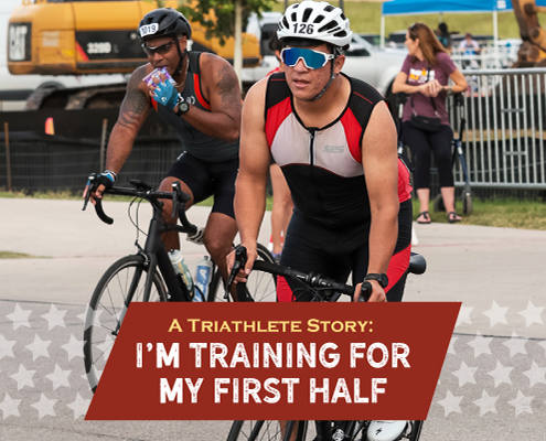 Maximiliano leaves transition on his bike during a sprint triathlon. Text on design reads A Triathlete Story: I'm Training for My First Half. Maximiliano talks about training for his first half distance triathlon. Read more at *link in bio*